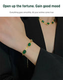 Emerald necklace earrings bracelet
